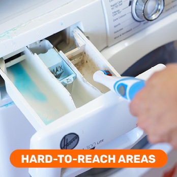 Person using Easy Clean 360 to clean those hard-to-reach areas in the washing machine drawer.