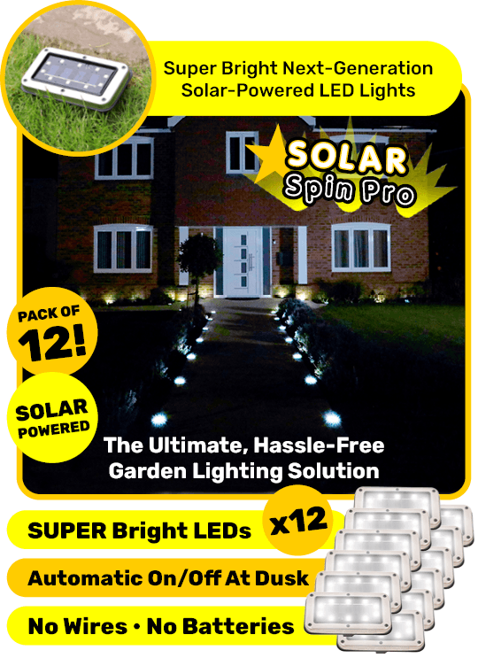 Front of home at night with Solar Spin Pro lining the pathway which is solar powered & comes in a pack of 12.