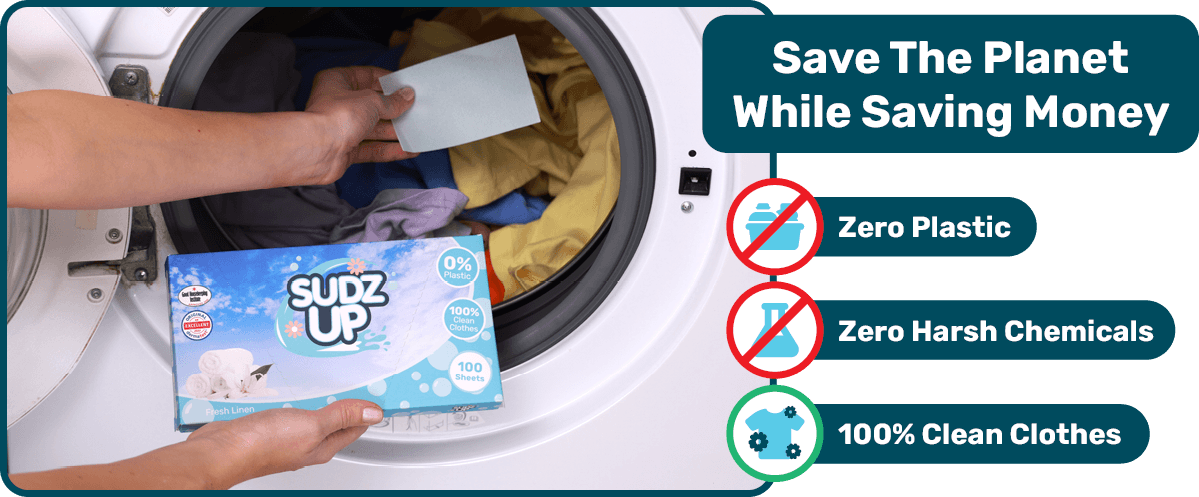 “Person holding SudzUP in front of the washing machine – box states 100% clean clothes with no plastic or chemicals.”
