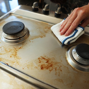 Wiping kitchen hob